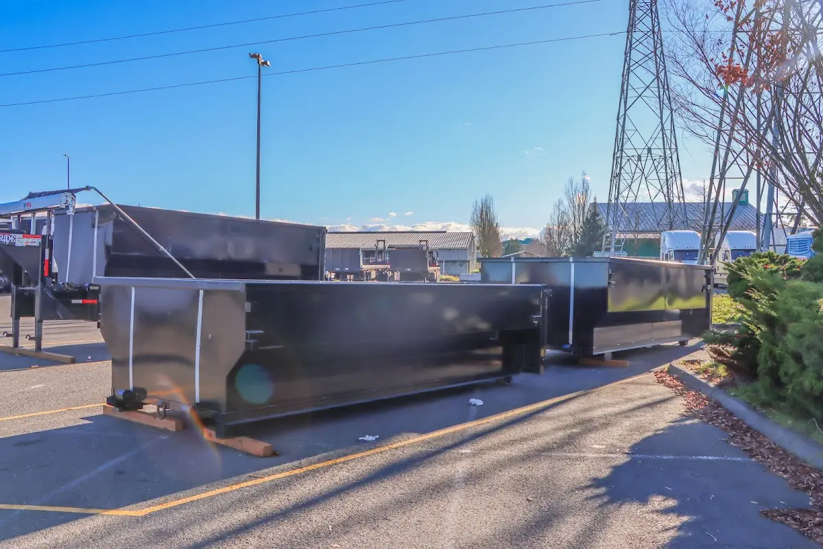 Roll-off dumpster ready for waste disposal at job site for 12 Yard Dumpster Rental in Lynwood